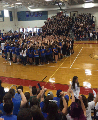 Lancer athletes unite on the pep rally floor to get ready for Mack Plaque weekend. 