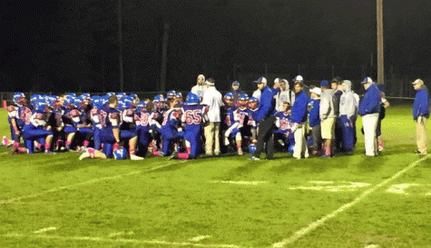 Freshman quarterback suits up with varsity team