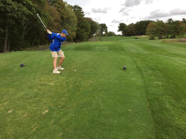 Senior Captain Jason Coburn helps bring his team to states with his powerful swing.