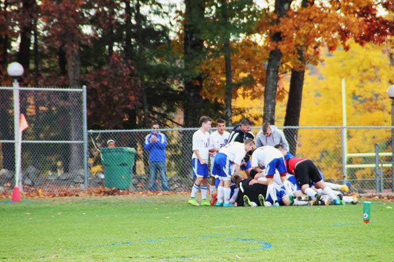 The boys soccer team wins in over time and advances to the quarterfinals.