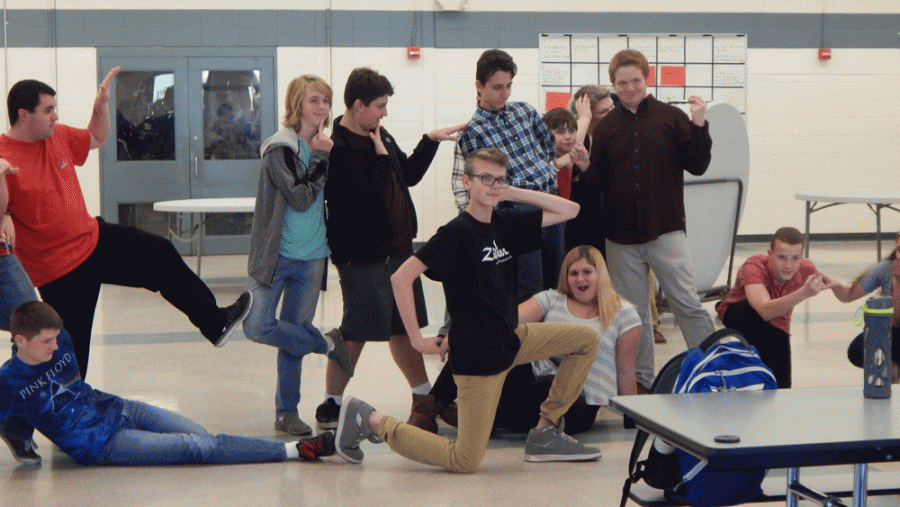 The improv club practices their photograph game during this past Friday’s rehearsal. In the photograph game, the actors are called on to stage one at a time to strike a pose. 