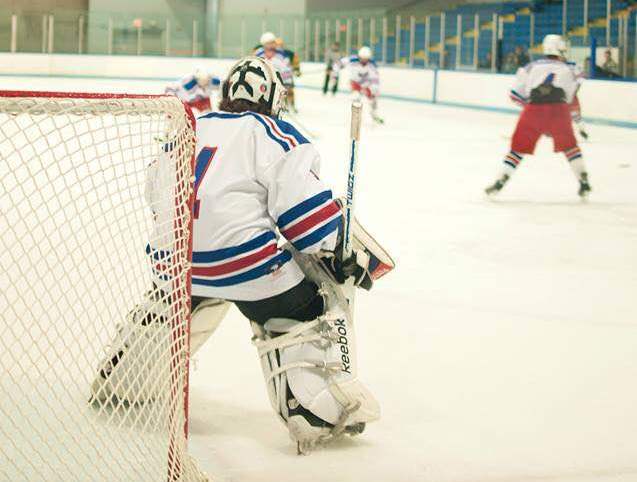 Junior Cody Baldwin plays goalie for the hockey team during a game last year.