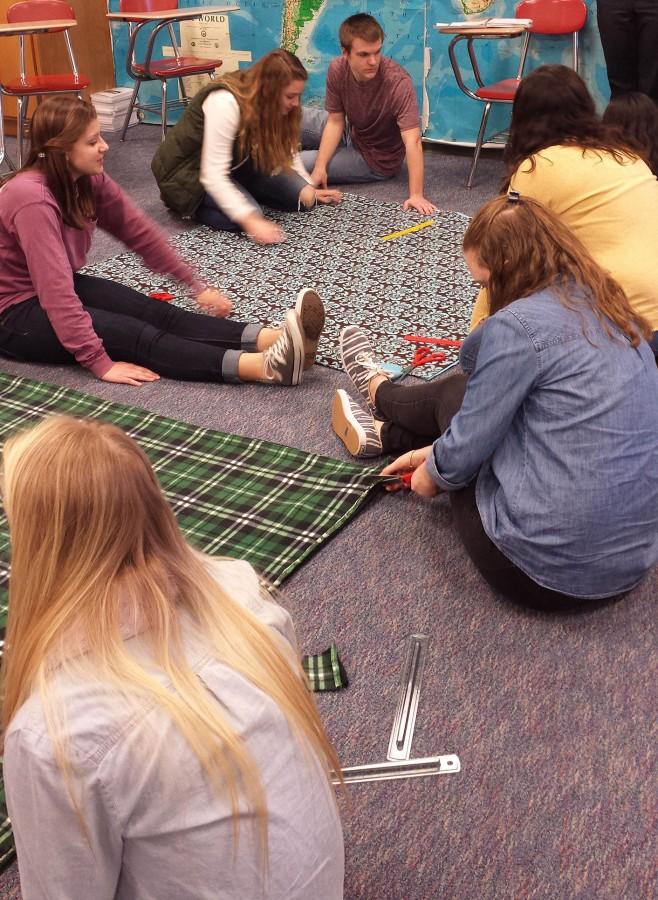 Community Service Club makes blankets for the elderly