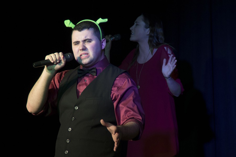 Performers from Shrek the Musical performed the song Who Id Be, featuring senior Dan Cain as Shrek and junior Sammy Honeywell as Fiona.