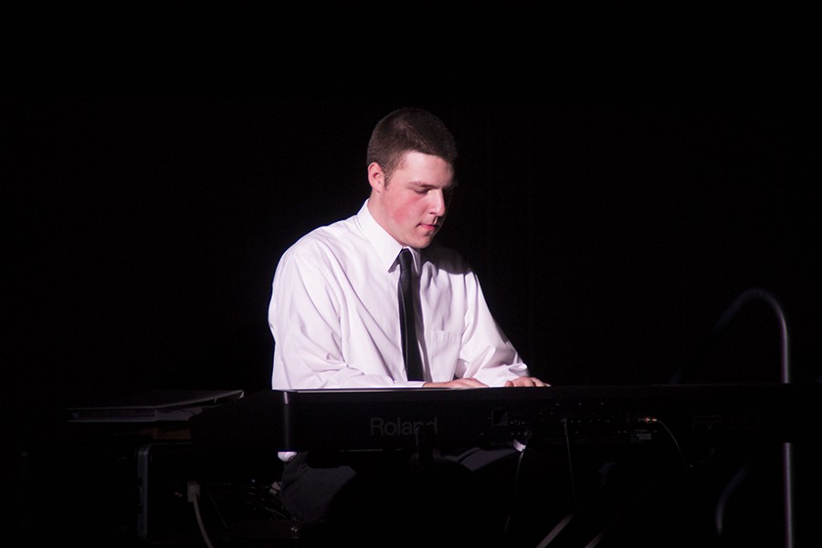 Senior Jason Coburn played Final Stride on piano.