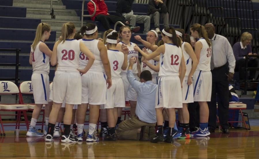 Girls basketball come out of a timeout preparing for the semi-final game.