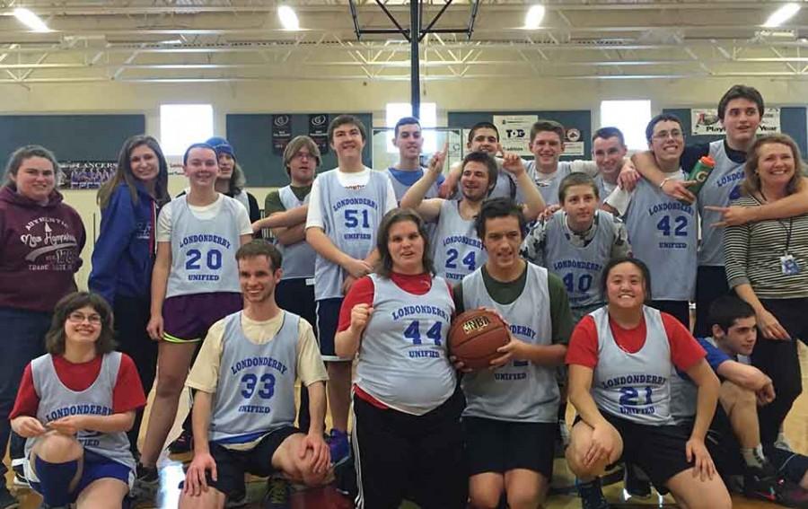 Unified basketball celebrates after beating Nashua South 58-54 during their 2016 season. This game solidified their undefeated season.