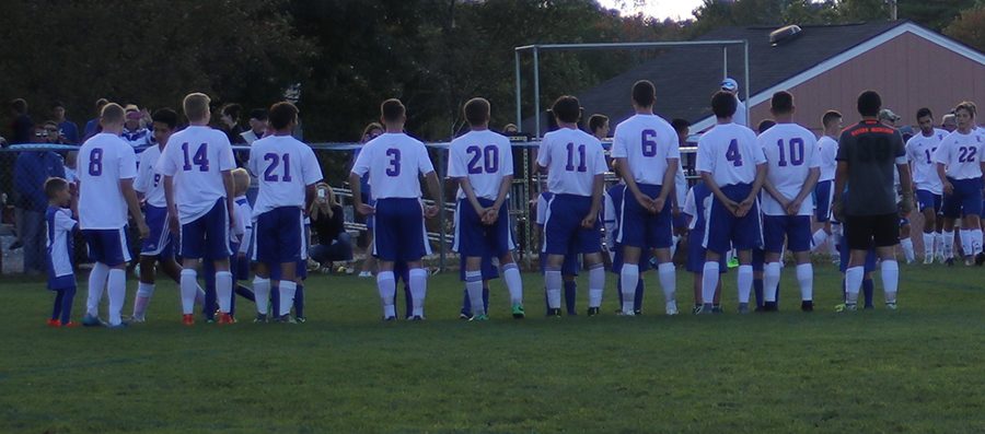 The boys soccer team line sup before one of their games. The team will need to bring a similar game 
plan against Memorial that made them successful last week against them. 