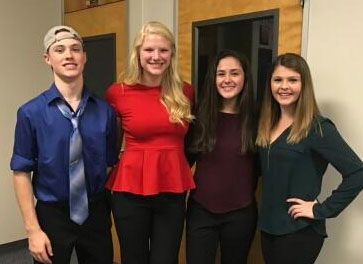 Hosh Posh Losh, an a cappella group created in honor of choir teacher Mrs. Loschiavo, performs at Prism this weekend.  Group members include sophomore Michael Crowley, junior Josie Collins, sophomore Abigail Palmer and founder of the group, junior Mary Sullivan. 