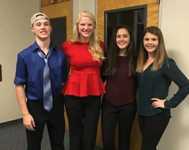 Hosh Posh Losh, an a cappella group created in honor of choir teacher Mrs. Loschiavo, performs at Prism this weekend.  Group members include sophomore Michael Crowley, junior Josie Collins, sophomore Abigail Palmer and founder of the group, junior Mary Sullivan. 