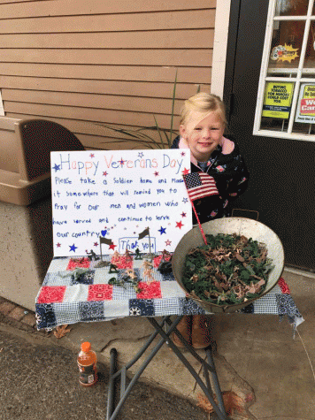 Grace Rich hopes Nutfield customers will read her sign and take a soldier to honor veterans on Veteran's Day.