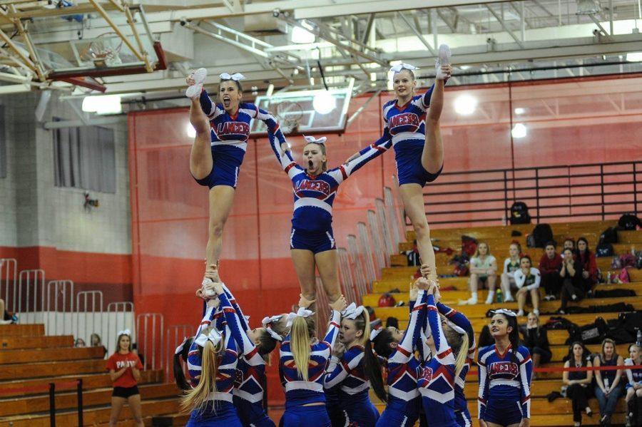 The crowd went wild as the girls hit the ending pose of the pyramid.
