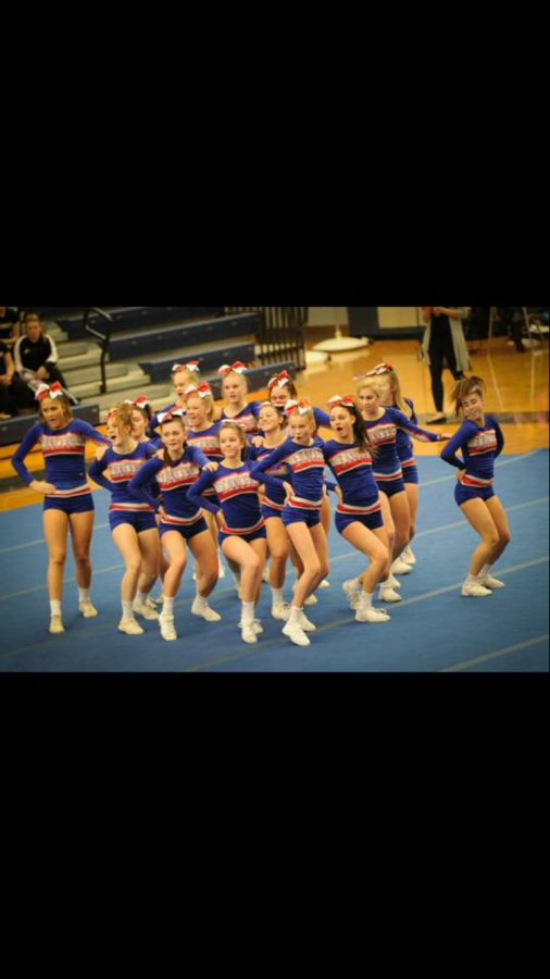 The cheerleaders dance it out to “Circus” by Britney Spears, which is the last element in the routine. The dance is around 35 seconds long or 5 eight counts.  This may not seem long, but after stunts, jumps, and tumbling, the cheerleaders are exhausted by the end of the routine. 