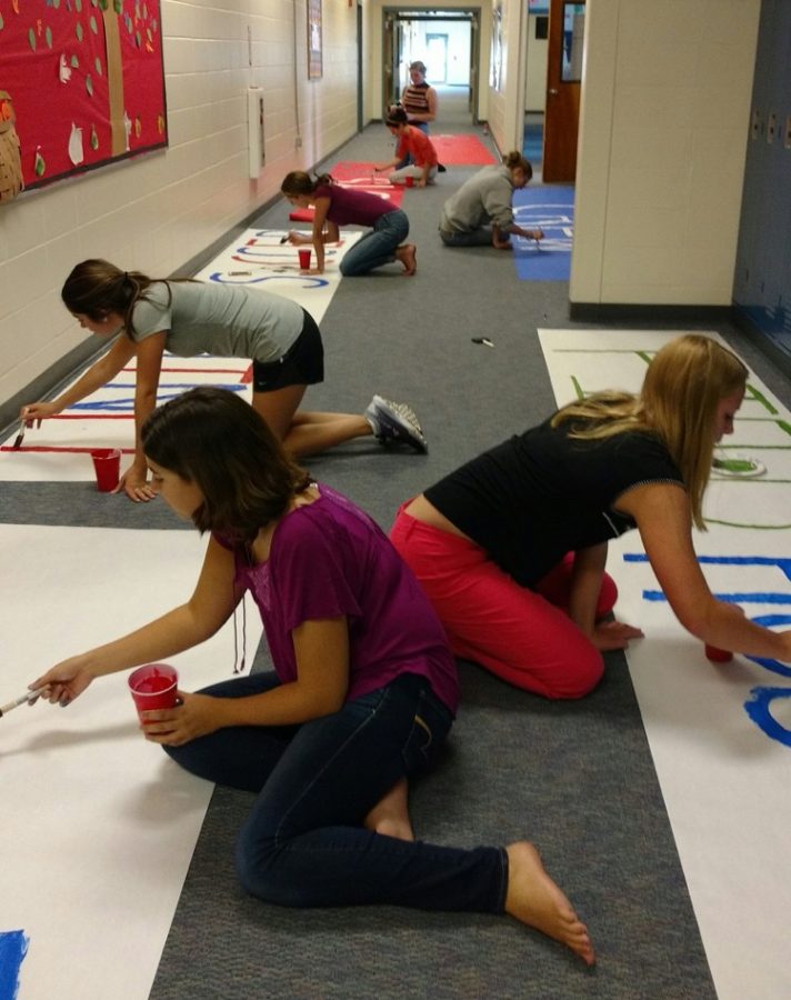 The Pep Rally Aides making the banners for the fall pep rally this year.  
