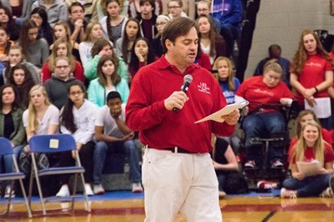 Pep rally advisor and English teacher Mr. Juster introduces the angels of  Pantene Beautiful Lengths in January of 2017