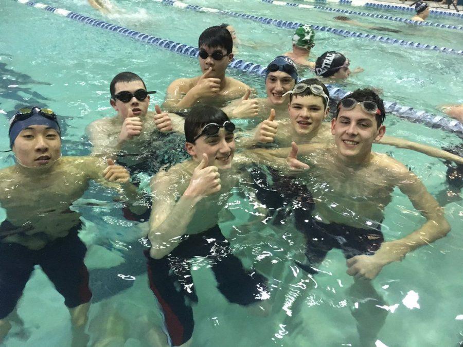 Swim teams see both success and improvement