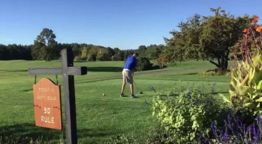 Brian Boyle sends his first drive of the day deep down the middle at the NH State Golf Tournament