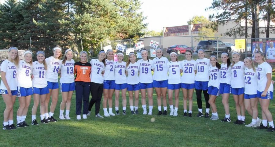 Girls soccer team shows their unity as they prepare for todays playoff game against Timberlane. 