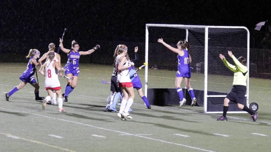 Junior Lauren Mullen, senior goal scorer Vanessa Magoon, sophomore Courtney Shay, and senior Allie Marsh celebrate after the game winning goal in their playoff against Pinkerton.