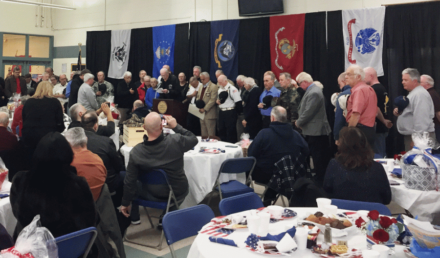 A representative from the Londonderrys American Legion recites their oath at the beginning of the Veterans Day Breakfast.