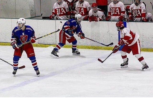 Sophomore Nick Pitarys (#22), skating around in a game against Pinkerton last season. This year coming off a leg injury sustained last season, he looks to prove why he made varsity hockey as a sophomore.