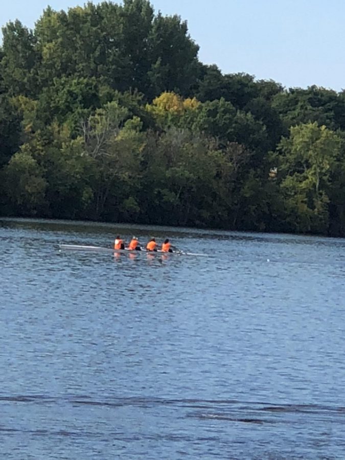 Rowers+race+at+the+Textile+River+Regatta+in+Lowell%2C+Massachusetts.