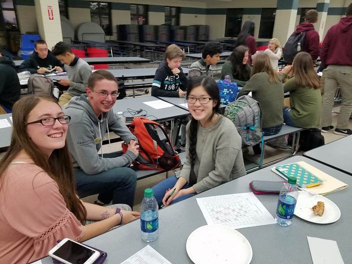 Math Team members Tim Gore and Katie Lacerda celebrate after home meet Wednesday, November 7.