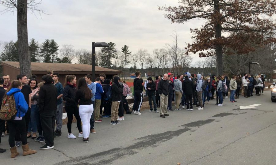 Students and faculty evacuate the building during Wednesdays false alarm. 