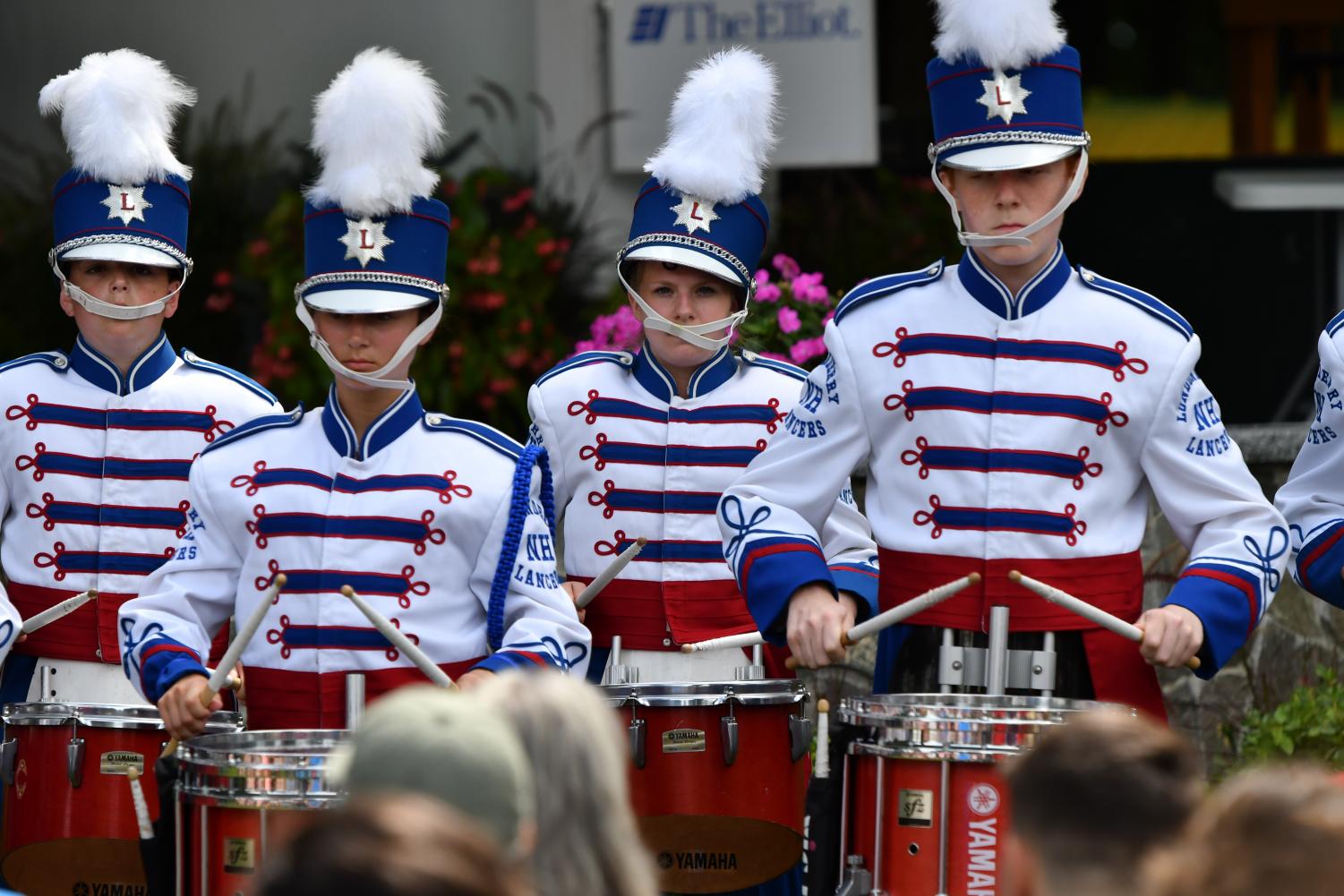 Gertz (second from the left) focuses intently on her performance at Old Home Days on August 8, 2018. The drum line also performs  at other evens such as parades, LHS football games, Celtics games and school pep rallies.