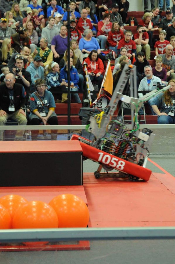 The robot begins its climbing sequence. One of the objectives of this years game was to climb to the top of large stair like platforms known as the Hab.