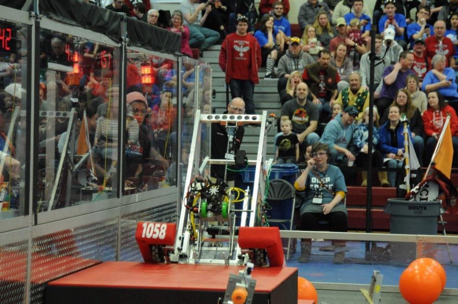 The robot begins the second part of its climbing sequence. The team received the excellence in engineering award for their unique climbing design.