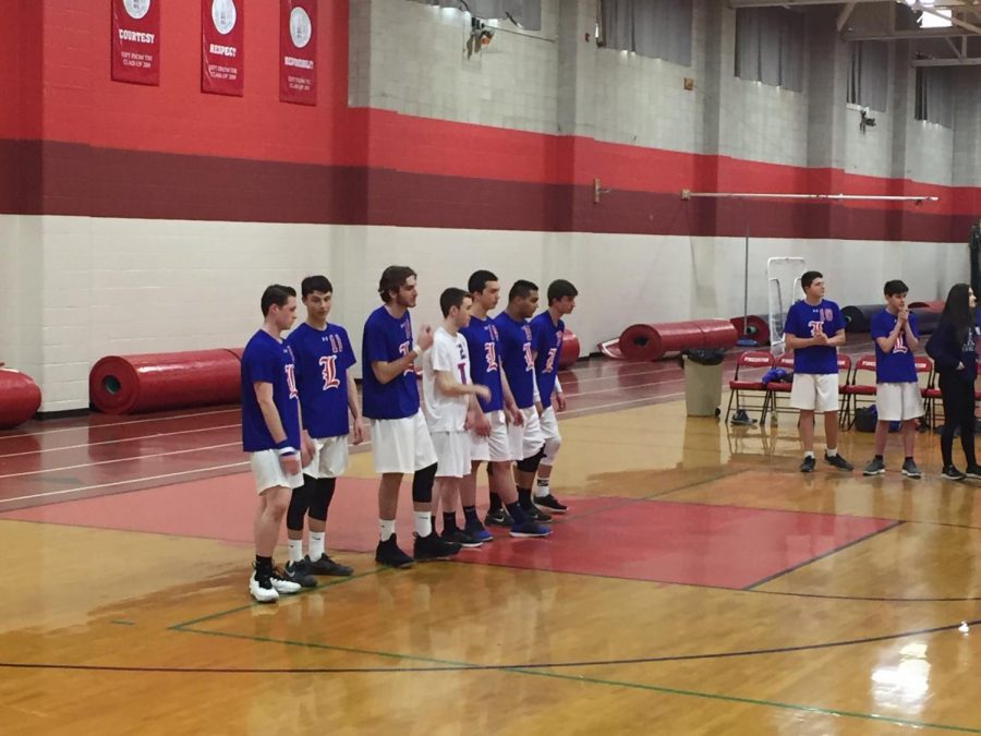 The boys line up on the back line before a match last season.