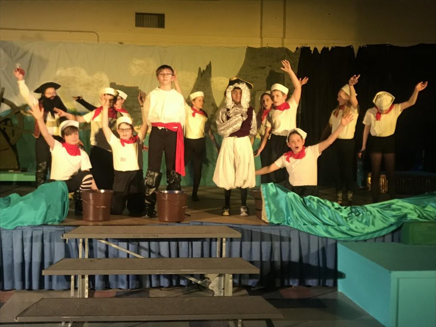 The sailors in South Schools performance of The Little Mermaid open the show, with Prince Eric taking the lead.