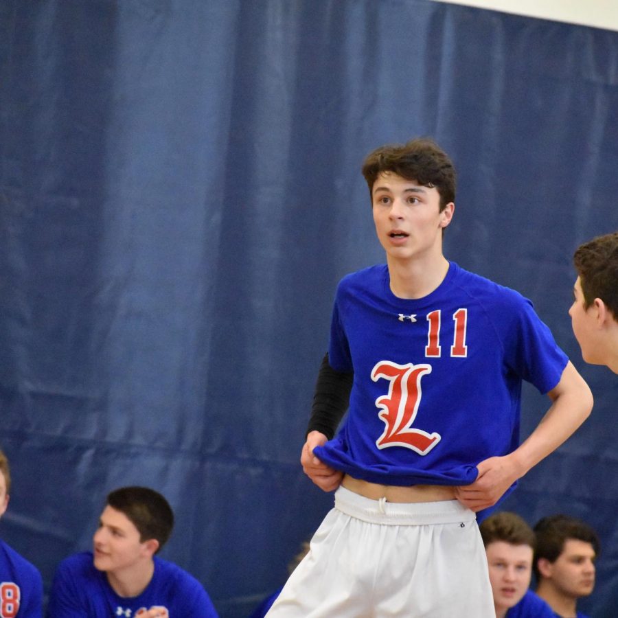 Senior Pat Cohen plays as a setter for the boys volleyball team.