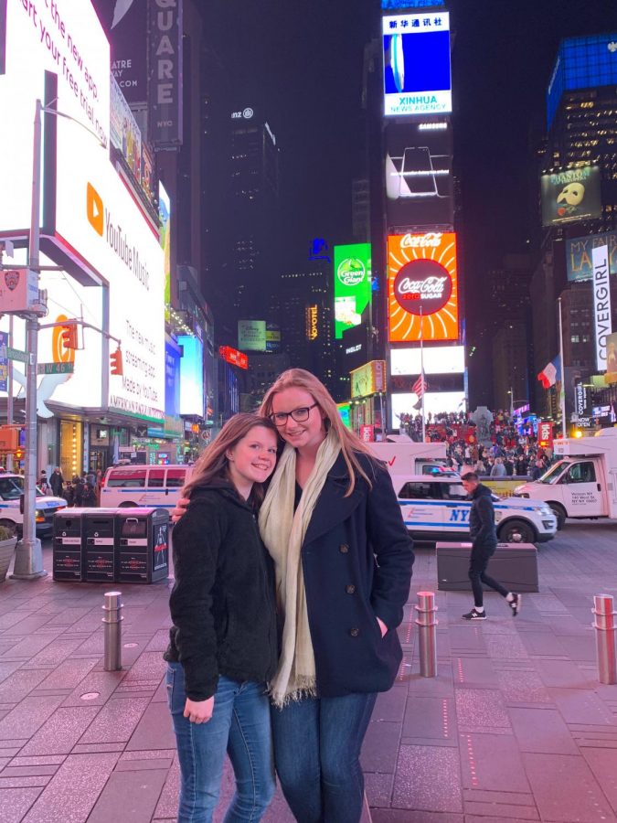 The two new yearbook chiefs pose in Times Square during a yearbook convention in New York.