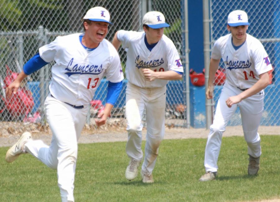 Manor celebrates with his teammates after getting the final out of the 4-1 victory vs. Pinkerton