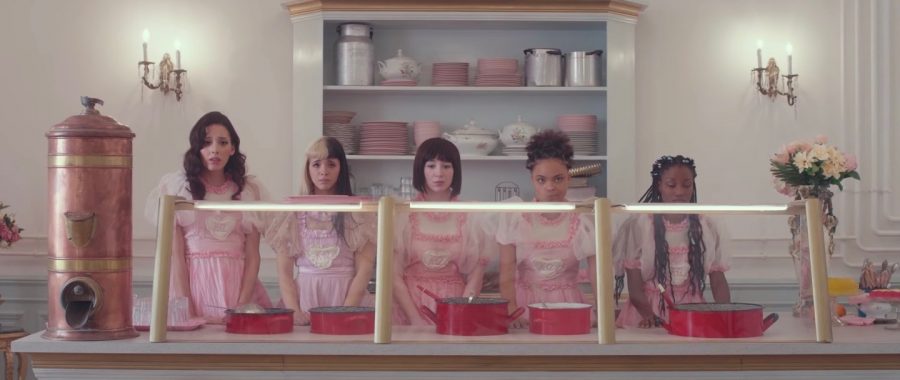 (From left to right) Fleur (played by Zion Moreno); Crybaby (Melanie Martinez); Angelita (Emma Harvey); Celeste (Megan Gage); and Magnolia (Zinnett Hendrex) watch as the food fight, started by Crybaby, unfolds. The food fight began after "Lunchbox Friends," as a way for Crybaby to separate Fleur from Kelly.
