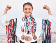 Lockhart displays all her medals from past karate competitions.