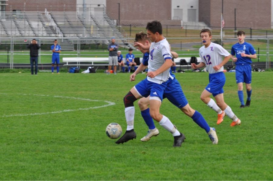 Keith Fletcher cuts off a Salem midfielder to regain control of the ball. The game resulted in a 2-2 tie.