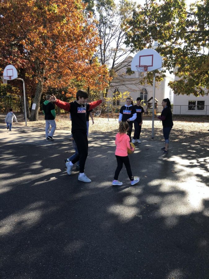 LHS fall athletes play recess games with Mathew Thornton students during Recess Academy.