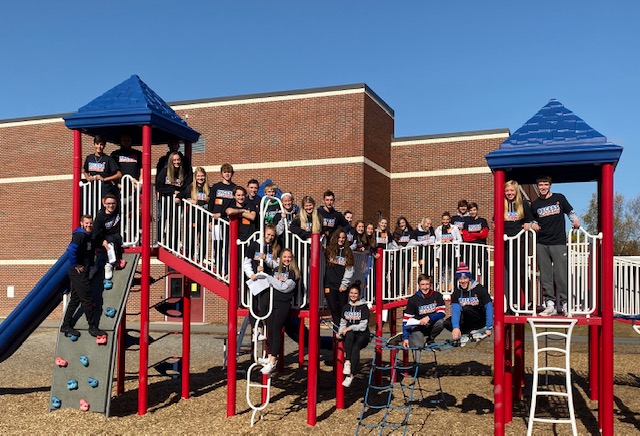 LHS fall athletes play recess games with Mathew Thornton students during Recess Academy.