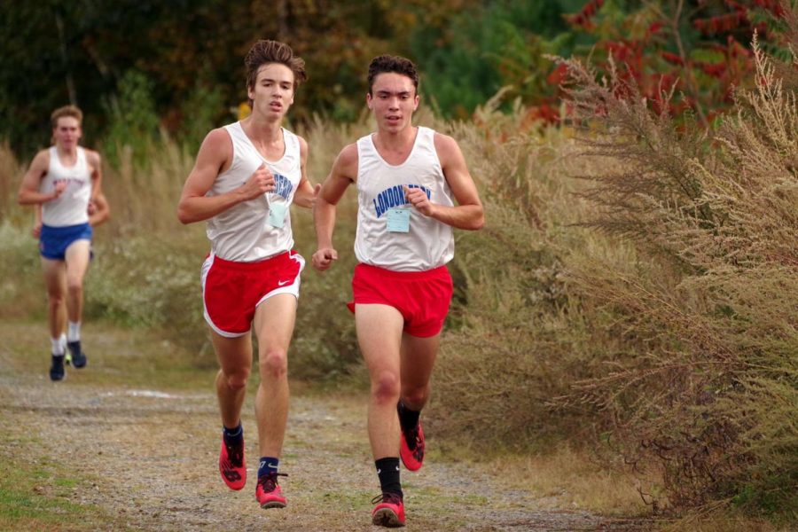 Senior Kerry Daley competes in his final home meet alongside his teammate. Daley has had an outstanding year coming in as a top runner for most of his meets. 