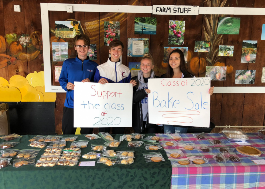 Senior Kerry Daley and fellow senior class officers Dylan Hotter, Abbie Ellis, and Rachel Court host a bake sale at Mack’s Apples. Cookies and fall treats were sold in the beginning of September to raise money for the senior class.