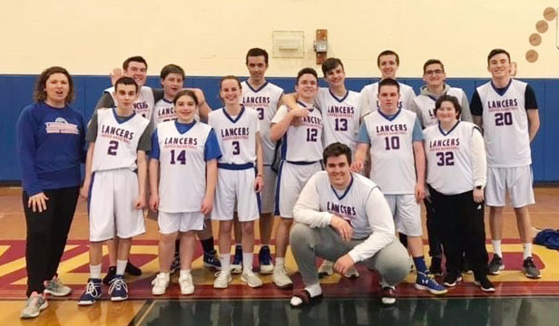 The 18-19 Unified basketball team gets ready for another game. Several players on this team are also on the 19-20 team.