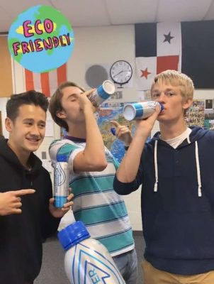 Seniors Will Kemball-Cook, Dylan Hotter, and Pete Misiaszek drink water from Green Council Club recyclable Pathwater bottles.