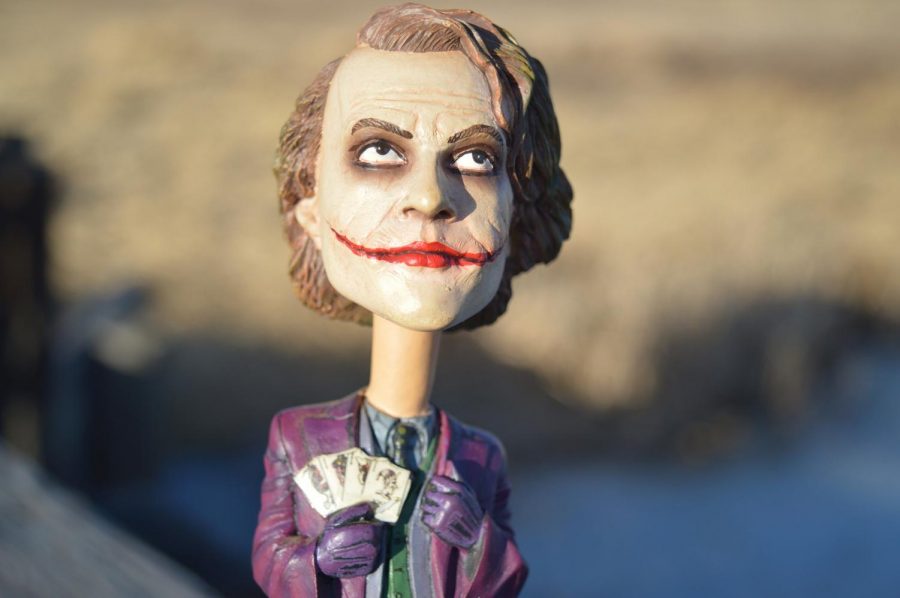 A bobble head showing Heath Ledgers Joker. Heath Ledger acted as Joker in the 2005 Dark Knight Trilogy.