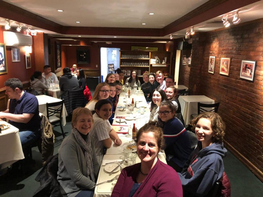 The Lancer Spirit staff sits together for dinner during a trip to a journalism conference in New York. 