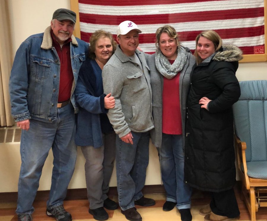 Katie Sullivan stands with her parents, the commander from the Londonderry American Legion, and her friend Marcy (left-to-right).