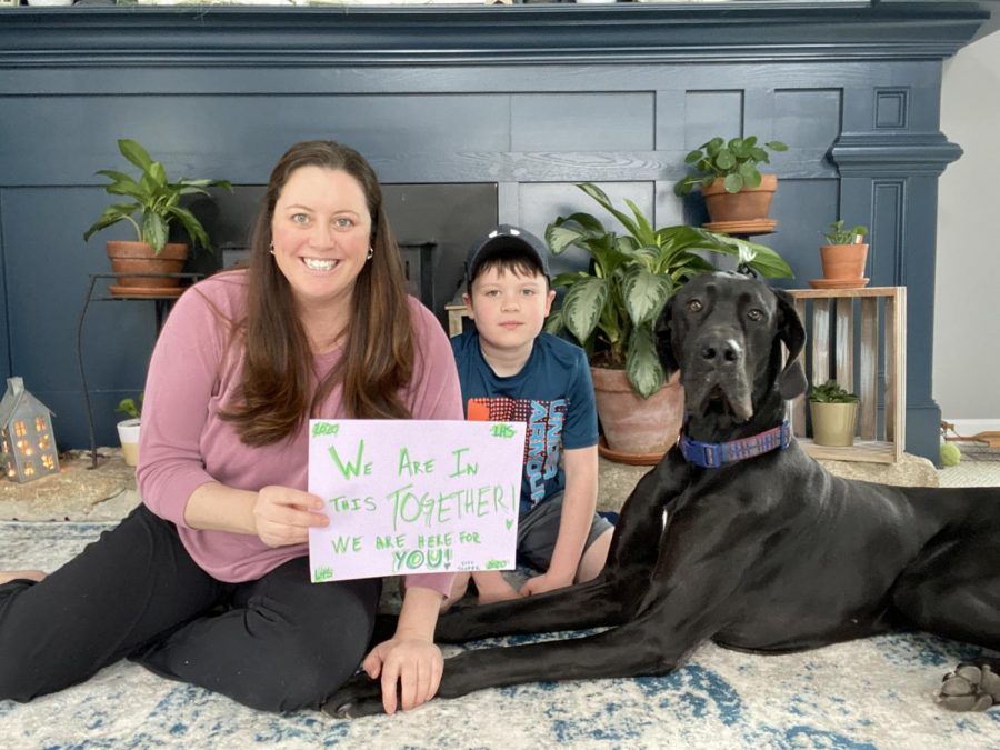 House 1 Assistant Principal Abbey Sloper wants students to know We are in this together and We are here for you. This picture, taken with her dog Dutch and 8-year-old son Jack, was submitted to Mrs. Rich as part of the video she put together for students. 