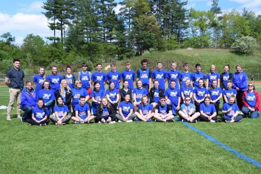 The 2018-2019 track team poses for a group photo. The 2020 season has been cancelled due to COVID-19.